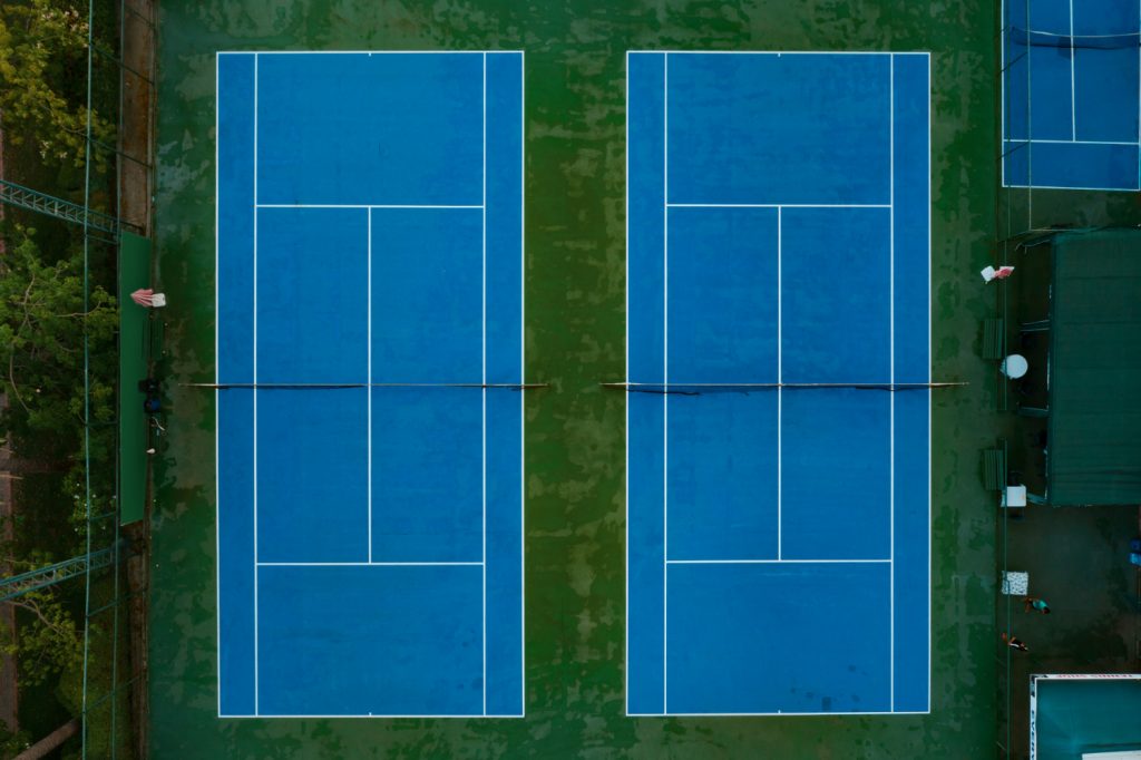 Play Pickleball on a Tennis Court - 2 pickleball courts on a tennis court 1024x682